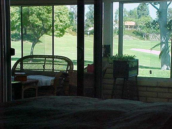 Sunroom with view of hold 7 on the executive golf course