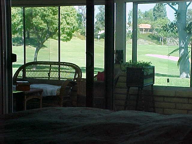 Sunroom with view of hold 7 on the executive golf course