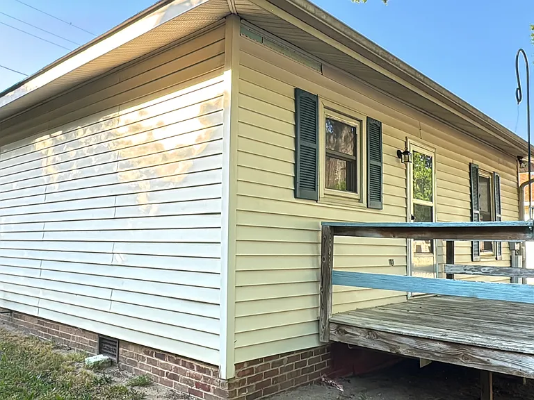 Private back deck perfect for evening grilling, relaxing outdoors, or enjoying morning coffee_your own little outdoor oasis.