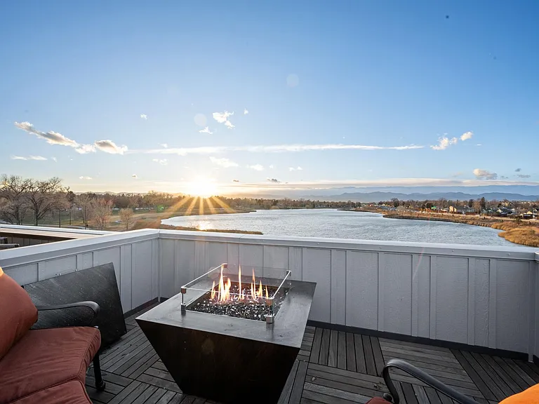There are moments in life when we feel incredibly lucky to be where we are and this rooftop is known for creating these moments. That's why the owners of this townhome chose this exact spot to declare their love and start their forever together.