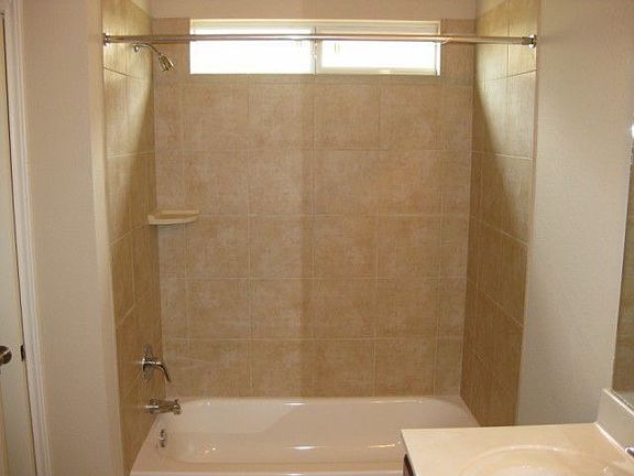 Designer tile shower surrounds
