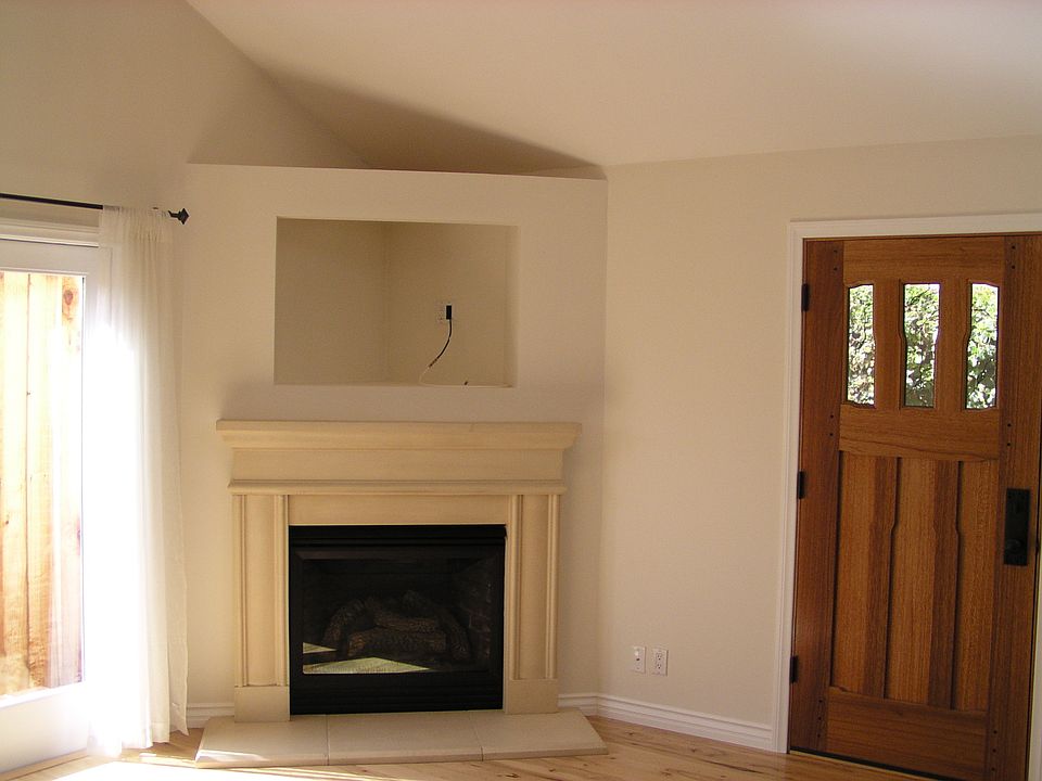 Fireplace/heater & Front door