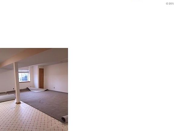 Open and airy lower level getting new carpet!