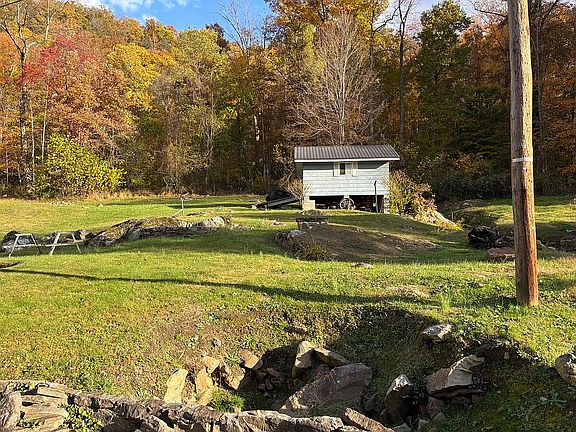 Back yard and 16’ building