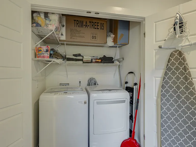 Brand-new washer and dryer with a starter supply of laundry detergent, plus an iron and ironing board, making it easy to keep up with laundry and look your best during your stay.