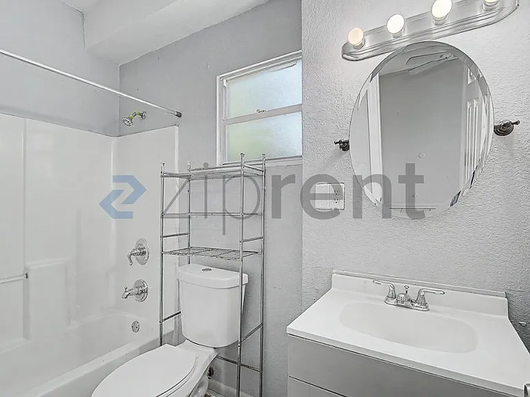 238 NE 57th St — Photo 13