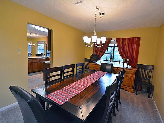 Next to the living area is the formal dining room. Great space, updated lighting with easy access to the kitchen.