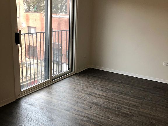 Living/dining area with sliding doors.