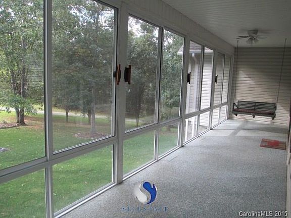 Four season sun porch to relax and unwind in a beautiful peaceful setting.
