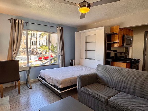 New couch cover (still a pull out sofa bed) - photo taken May 21 2025. Updating with additional photos soon!