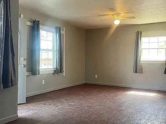 Welcome to this beautifully renovated 4-bedroom, 2-bath, 1,449 sq ft home — Photo 2