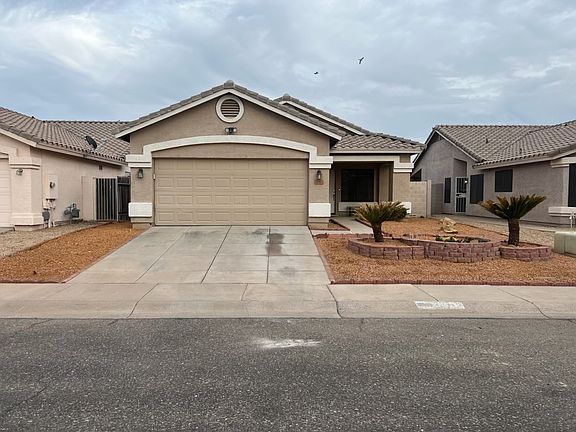 2 car garage with large driveway. New paint inside garage. Gararage has two large shelving racks for oraganization.