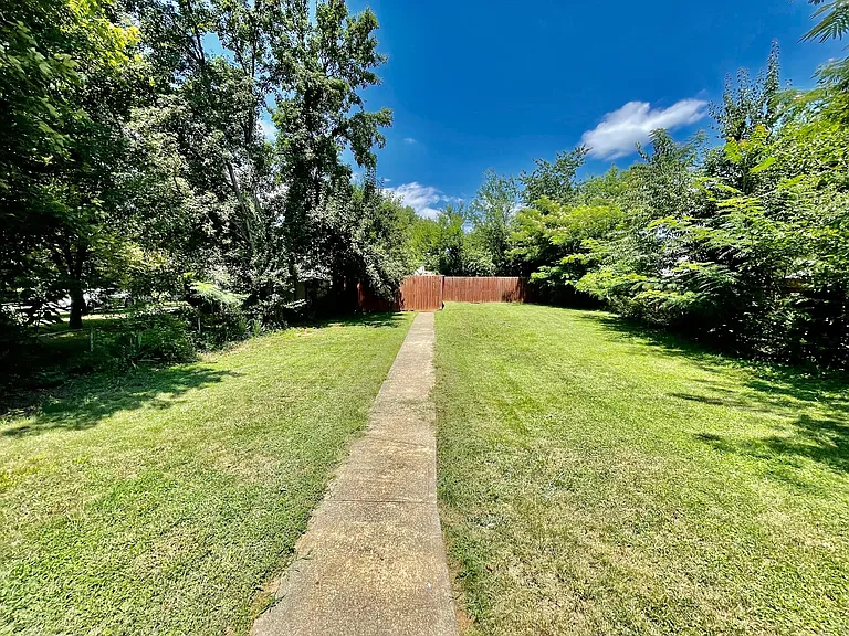 LARGE FENCED IN BACKYARD!
