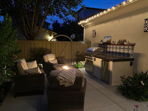 Built in gas grill with mini fridge is perfect for entertaining!