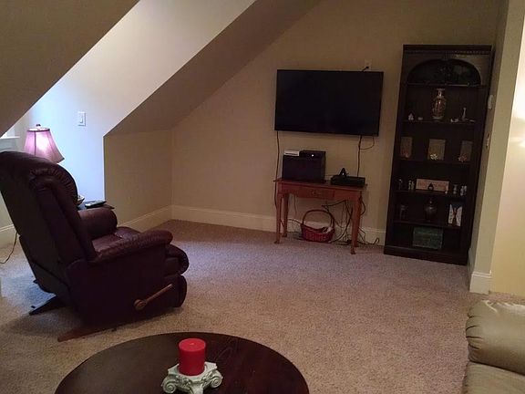 LazyBoy recliner with flat screen TV