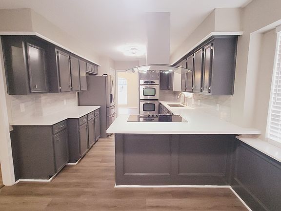Spacious Kitchen with Cook top, Fridge and Double Oven