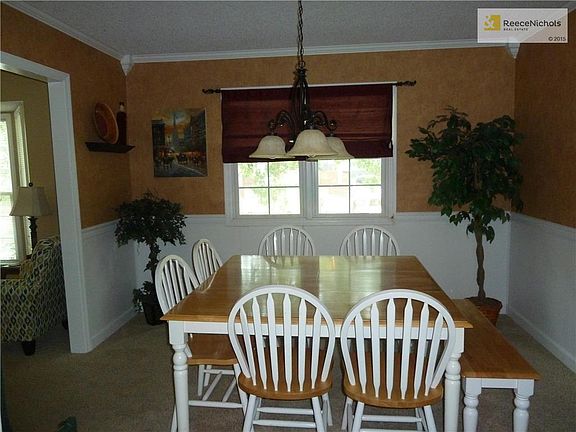 wainscoting and beautiful trim work in this formal dining room.