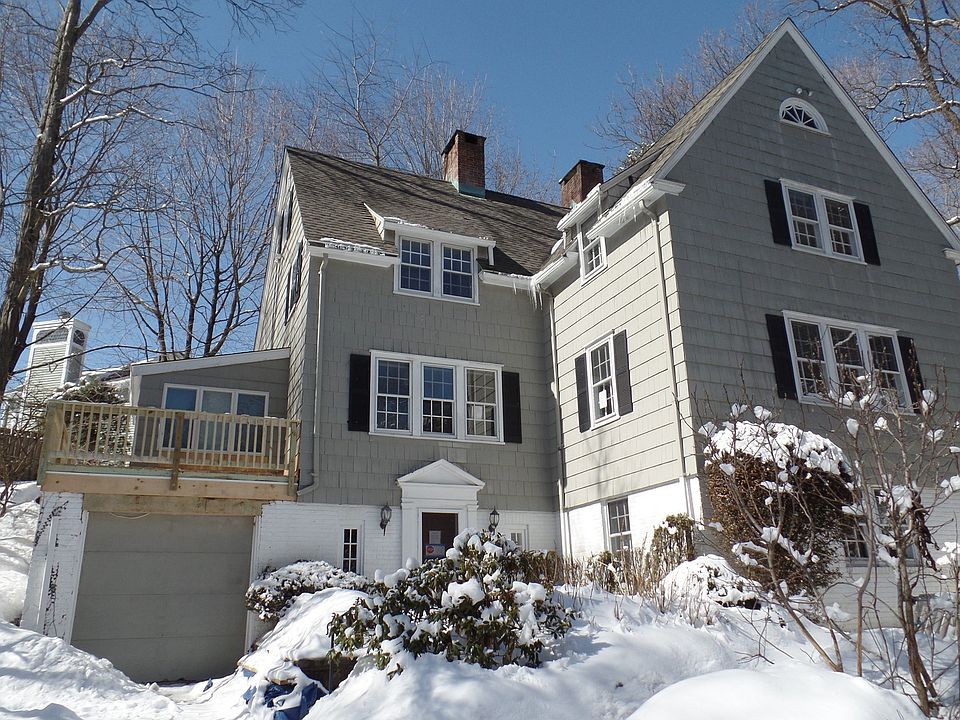 Classic Elegant Colonial with Condo Convenience!
