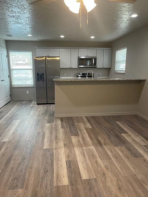 1st image of 102 8th St APT A