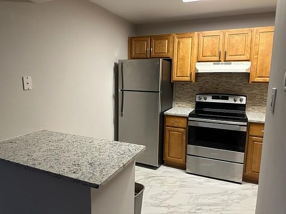 New appliances, backsplash, and granite countertops