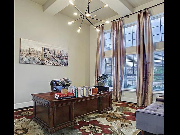 Handsome Study: French doors, coffered ceiling, hardwood floors, and eclectic chandelier.