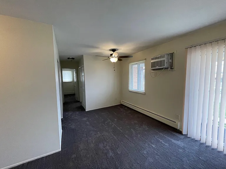 Eating area features a brand new ceiling fan and light fixture