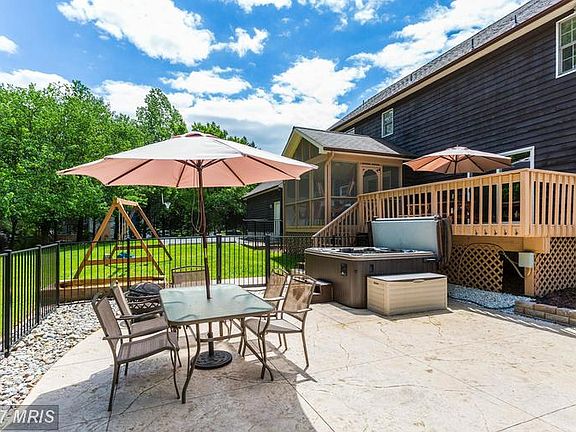 Hot tub, patio, and deck