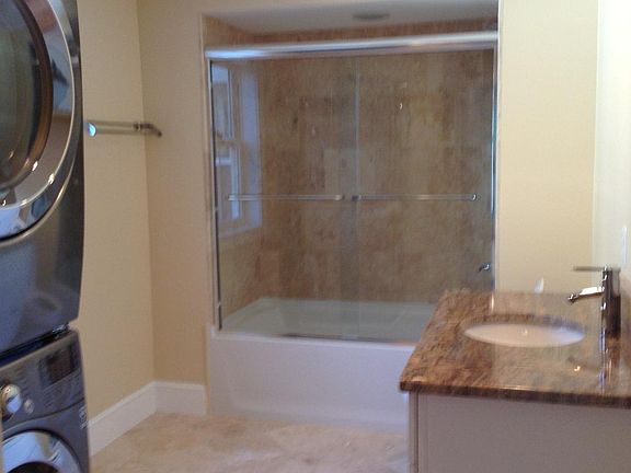 guest bath with washer and dryer