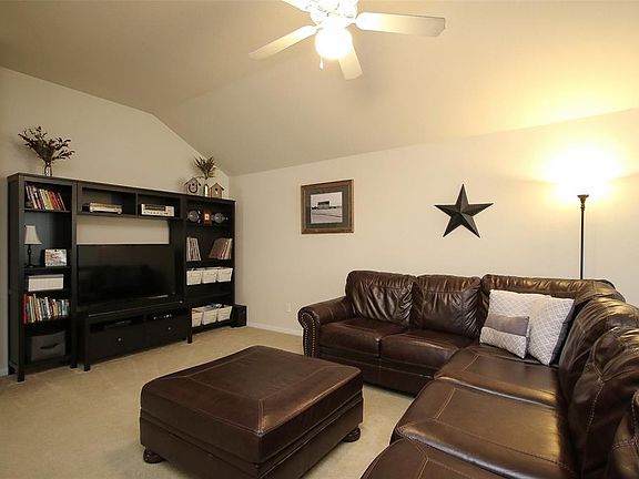Plenty of wall space in the family room for a large entertainment center.
