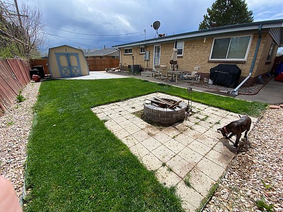 Backyard also has a fire pit!