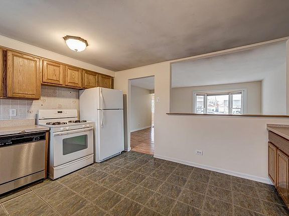 5th image of 8811 S Kolmar Ave