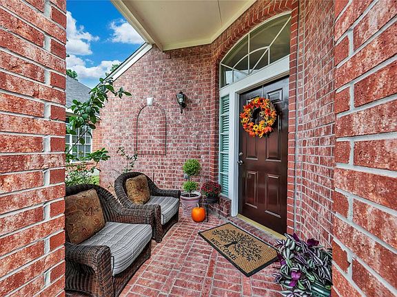 Welcome home! Covered front porch is great place to have you