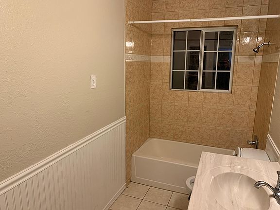 Hall Bath with wainscoating.