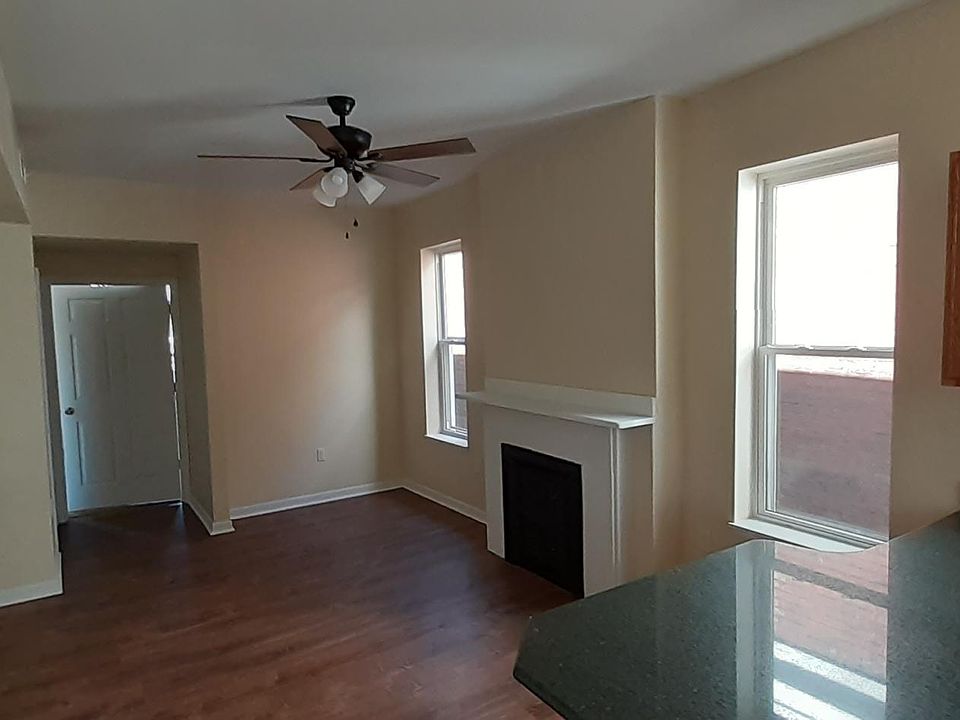 view to the left upon entering 2nd floor, living room, coat closet and utility closets to left