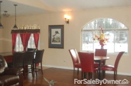 Large Dining and Bar arched windows : Enjoy Fireplace from dining and living area, large deck from k