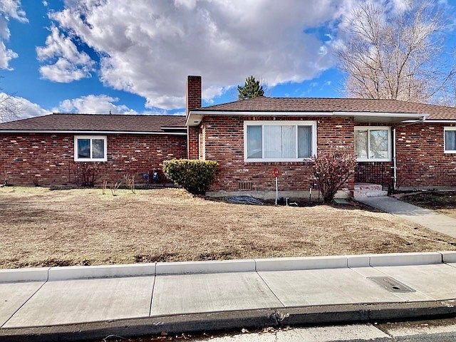 Charming brick house on a large lot.