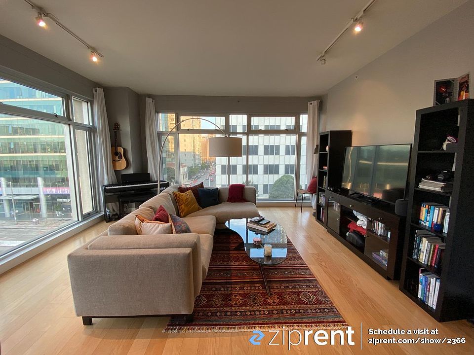 Large corner unit with hardwood floors