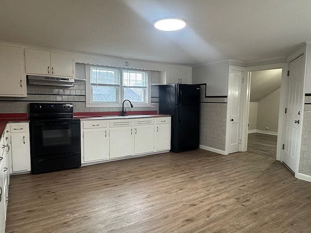 Kitchen view to bedroom 2