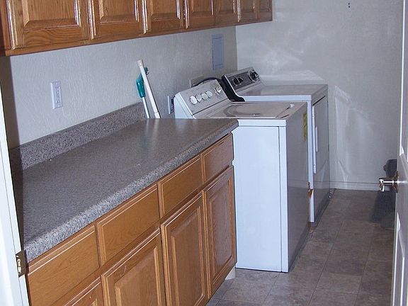 Large laundry room with tons of storage