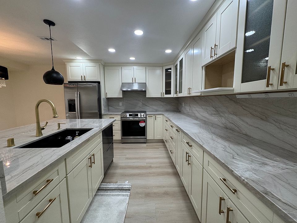 Ample of soft close storage and stone countertop space