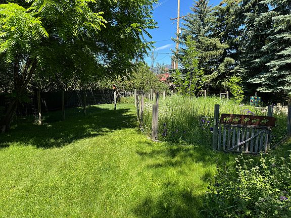 Beautiful yard with wildflower garden. Tenant can use yard.
