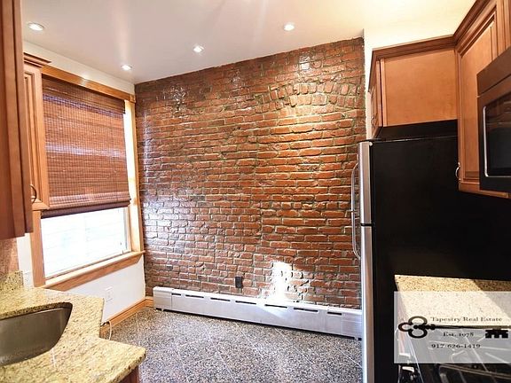 4th image of 3206 36th Ave APT 2F