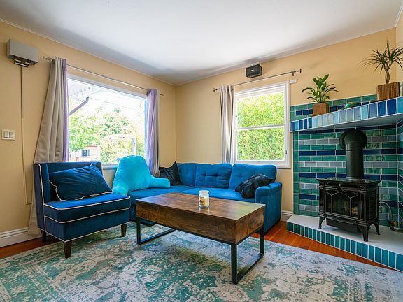 Natural Gas fireplace. Couch also folds out into a bed