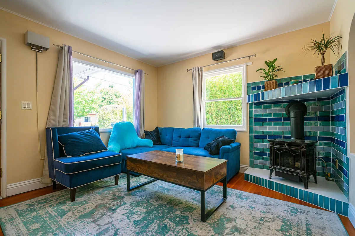 Natural Gas fireplace. Couch also folds out into a bed - 461 66th St