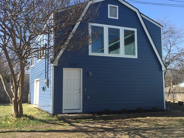 front view of property, apartment is on second floor