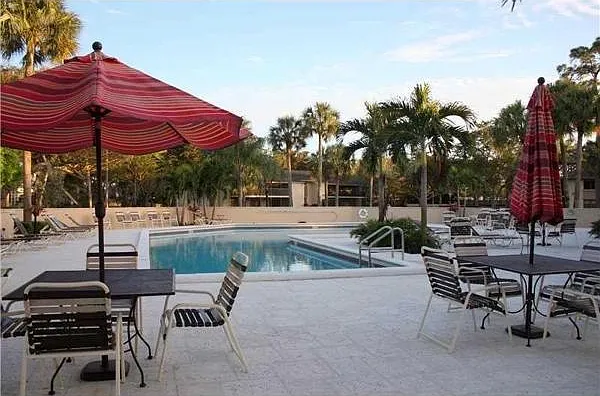 Large heated pool next to condo