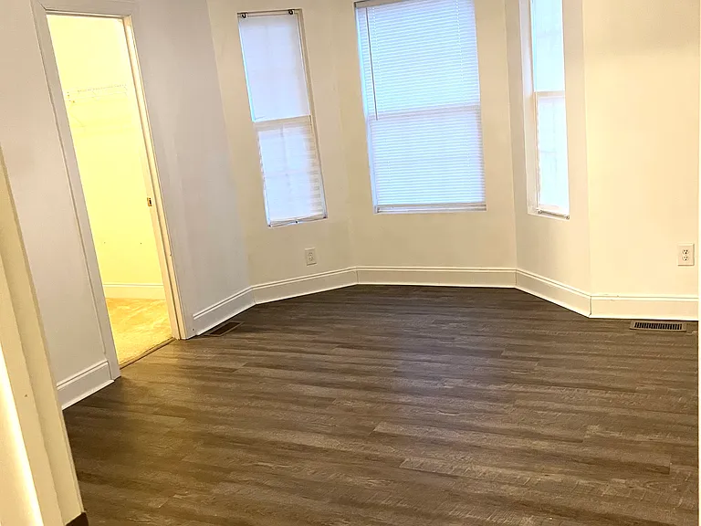 Master Bedroom with bay windows.