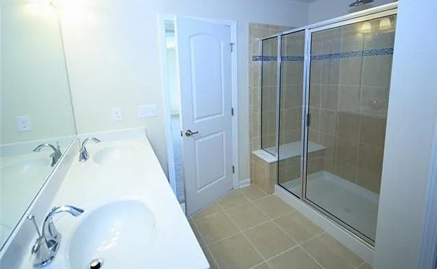 Tiled master shower with a seat, Rain shower and hand shower