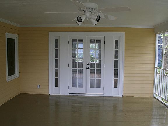French door view of  Back Screened Porch