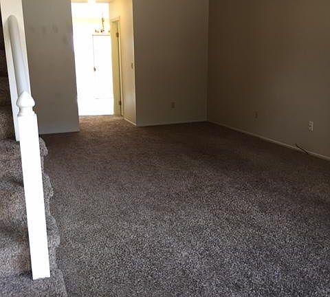 Living room with staircase up